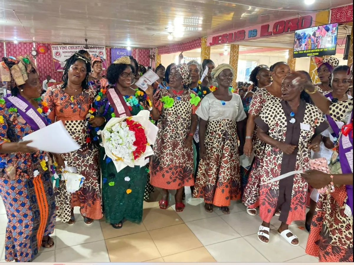 a group of people standing in front of a painting