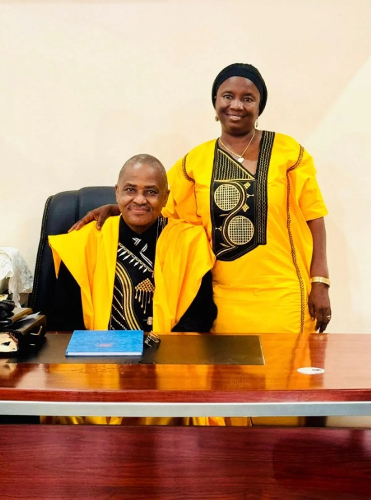 A bishop reading from a book during a service